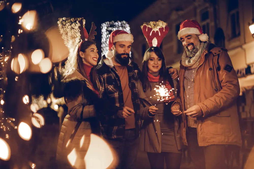 Women in festive headbands celebrating.
